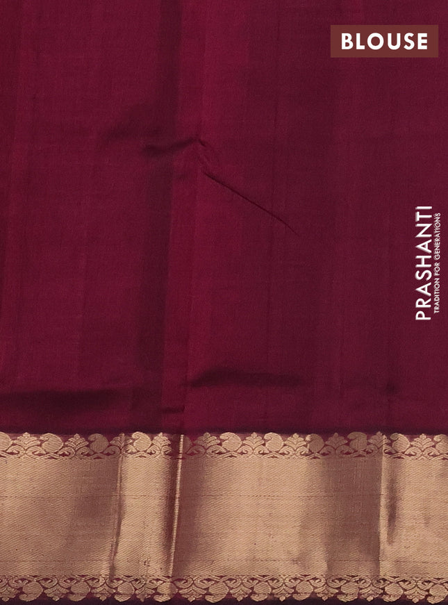 Silk cotton saree wine shade with paisley zari woven buttas and zari woven border
