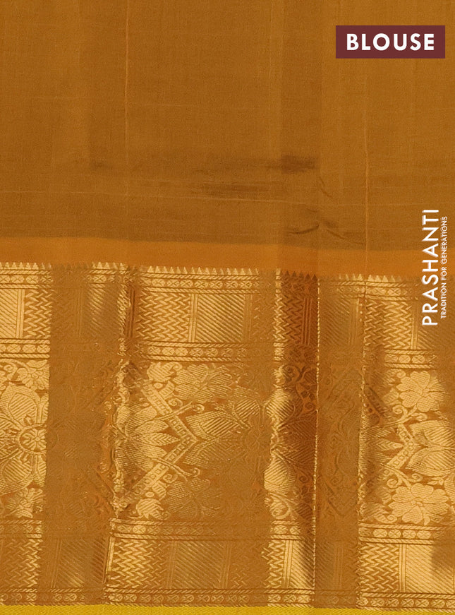 Silk cotton saree dual shade of green and mustard yellow with allover silver & gold zari woven buttas and long rich zari woven border