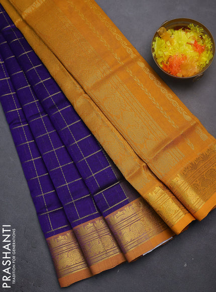 Silk cotton saree blue and mustard yellow with allover zari checked pattern and rich zari woven border
