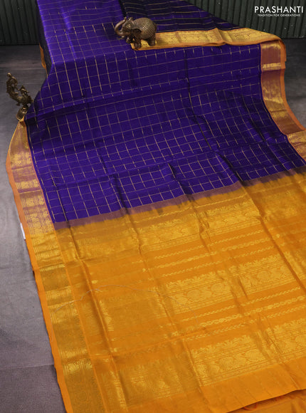 Silk cotton saree blue and mustard yellow with allover zari checked pattern and rich zari woven border