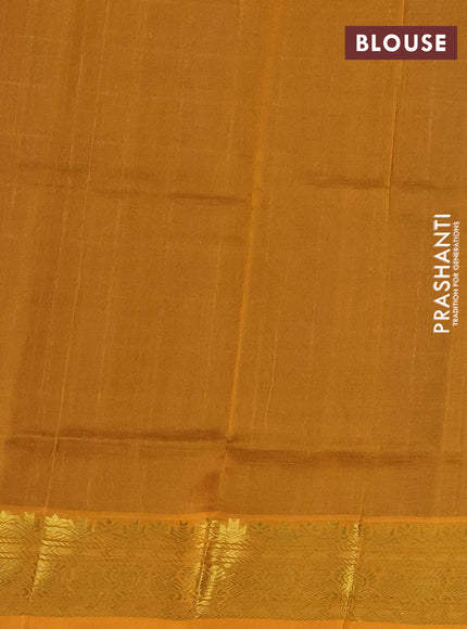 Silk cotton saree blue and mustard yellow with allover zari checked pattern and rich zari woven border