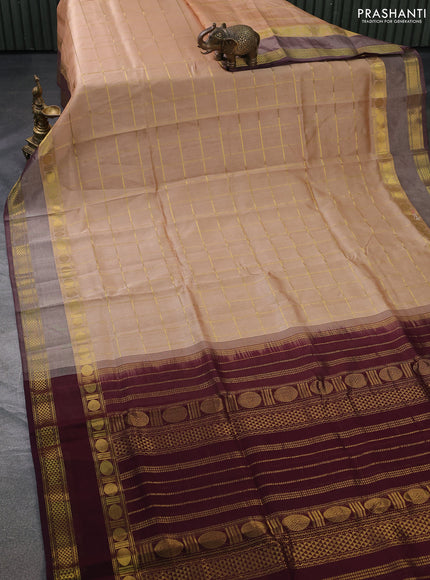 Silk cotton saree sandal and wine shade with allover zari checked pattern and rettapet zari woven border