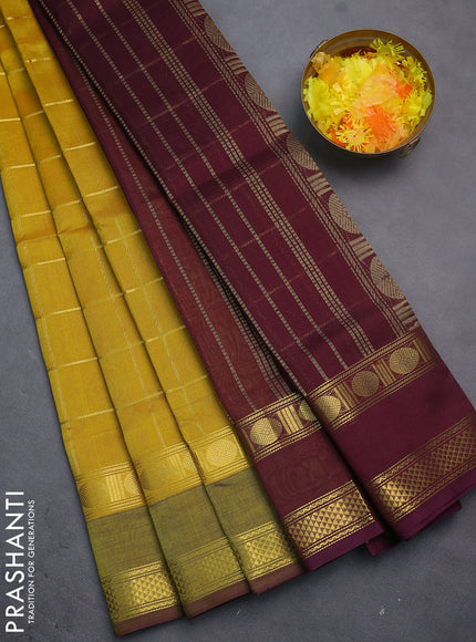 Silk cotton saree mustard yellow and wine shade with allover zari checked pattern and rettapet zari woven border