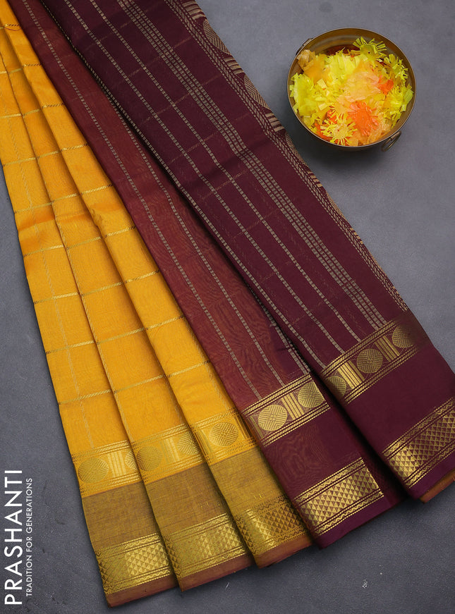 Silk cotton saree mango yellow and wine shade with allover zari checked pattern and rettapet zari woven border