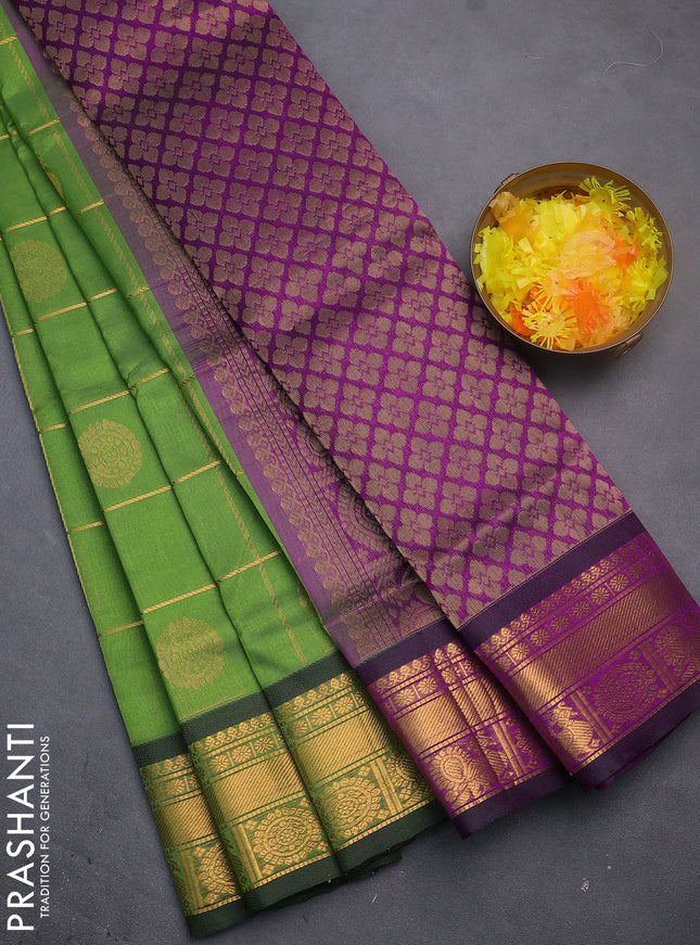 Silk cotton saree green and purple with allover zari checked pattern and rich zari woven border