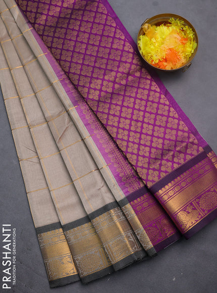 Silk cotton saree beige and purple with allover zari checks & buttas and zari woven border