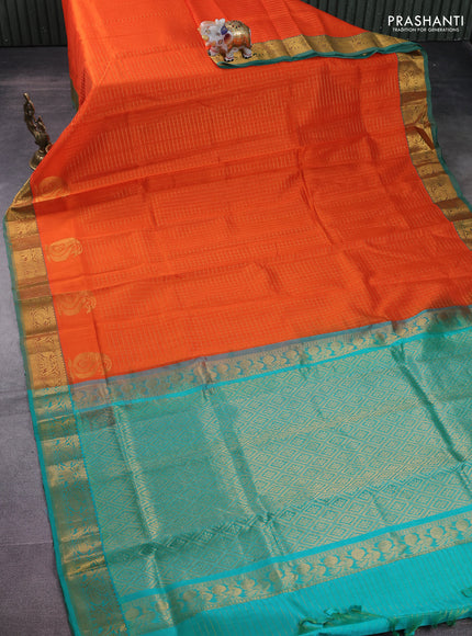 Silk cotton saree orange and teal green with allover zari checked pattern and rich zari woven border
