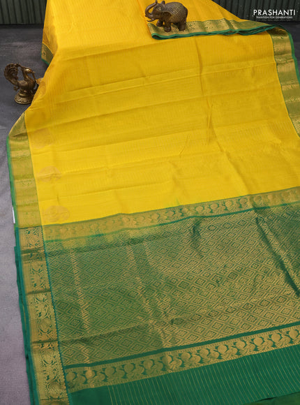 Silk cotton saree yellow and green with allover zari checked pattern and rich zari woven border