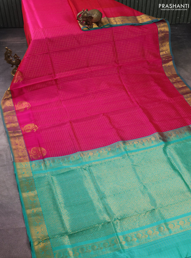 Silk cotton saree pink and teal green with allover zari checked pattern and rich zari woven border