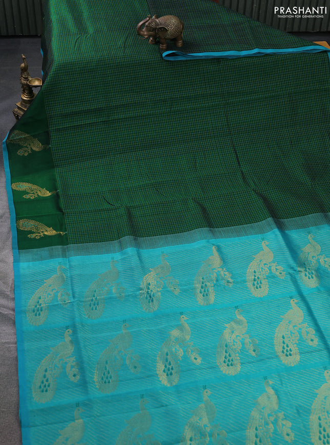 Silk cotton saree dark green and teal blue with allover thread checked pattern and peacock design zari woven butta border