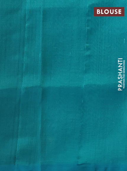Silk cotton saree dark green and teal blue with allover thread checked pattern and peacock design zari woven butta border