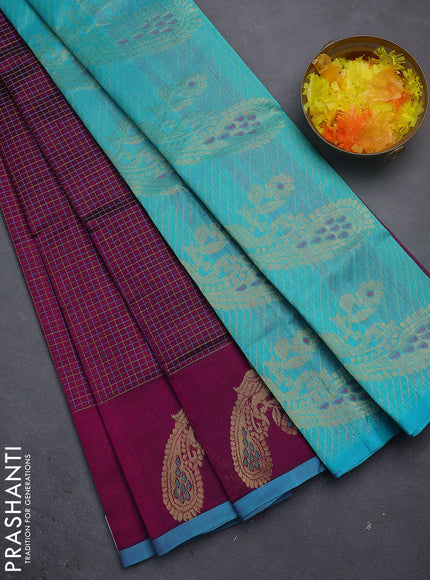 Silk cotton saree purple and teal blue with allover thread checked pattern and peacock design zari woven butta border