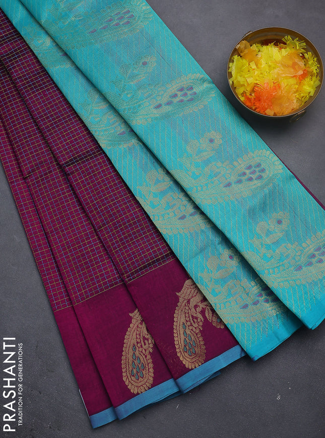 Silk cotton saree purple and teal blue with allover thread checked pattern and peacock design zari woven butta border