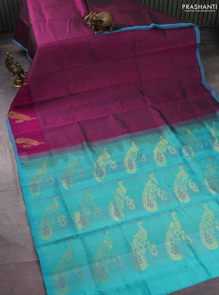Silk cotton saree purple and teal blue with allover thread checked pattern and peacock design zari woven butta border