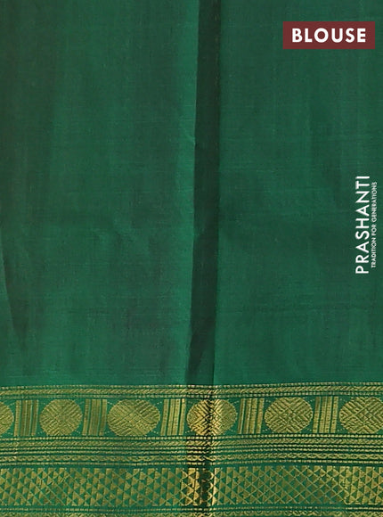Silk cotton saree pink and green with allover lakshadeepam weaves and zari woven border