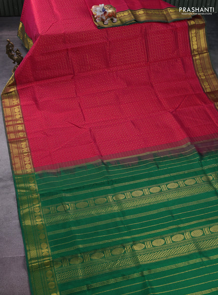Silk cotton saree pink and green with allover lakshadeepam weaves and zari woven border