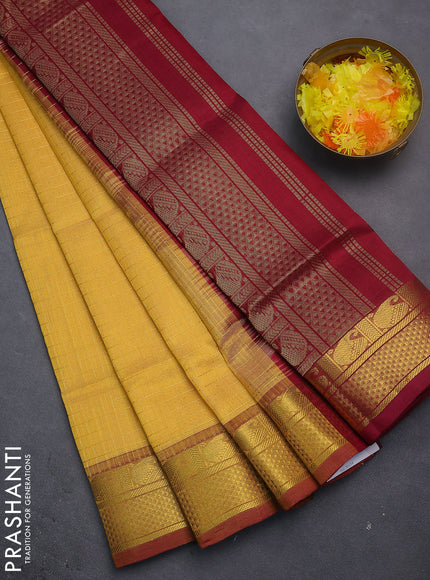 Silk cotton saree yellow shade and maroon with allover lakshadeepam weaves and zari woven border