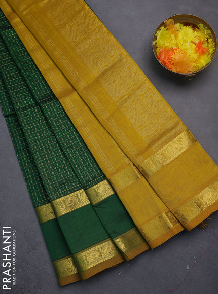Silk cotton saree green and mustard yellow with allover lakshadeepam weaves and rettapet zari woven border