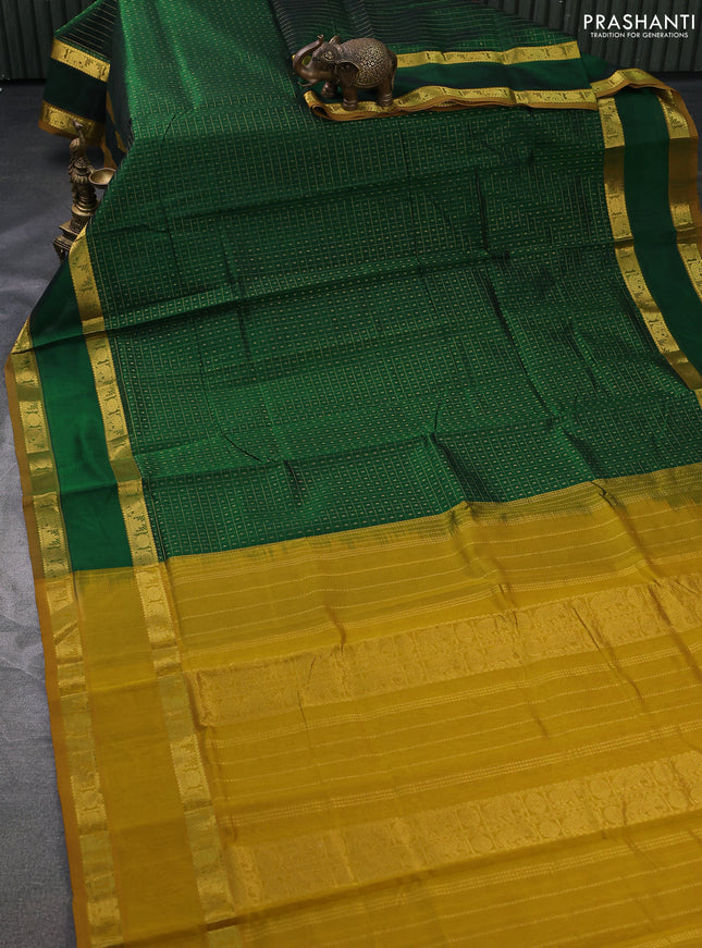 Silk cotton saree green and mustard yellow with allover lakshadeepam weaves and rettapet zari woven border