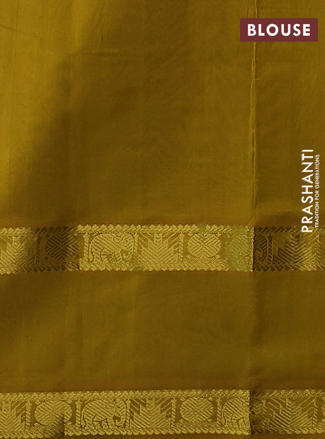 Silk cotton saree green and mustard yellow with allover lakshadeepam weaves and rettapet zari woven border