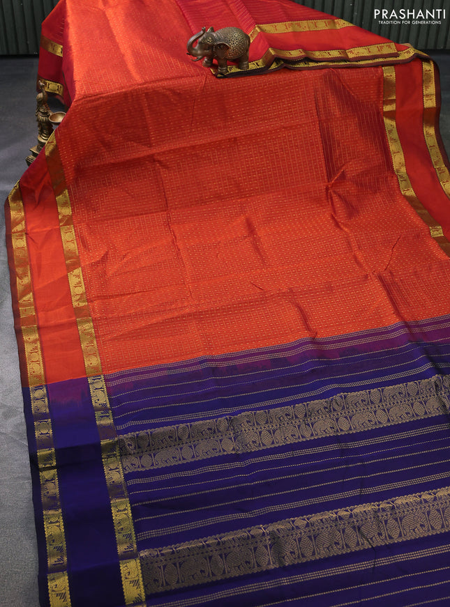 Silk cotton saree rustic orange and blue with allover lakshadeepam weaves and rettapet zari woven border