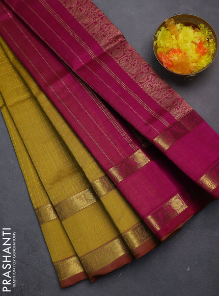 Silk cotton saree mustard yellow and magenta pink with allover lakshadeepam weaves and rettapet zari woven border