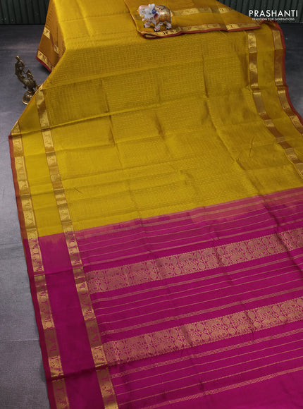 Silk cotton saree mustard yellow and magenta pink with allover lakshadeepam weaves and rettapet zari woven border