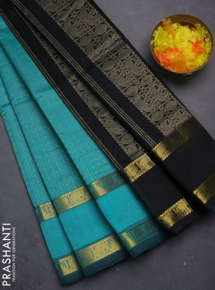 Silk cotton saree teal blue and black with allover lakshadeepam weaves and rettapet zari woven border