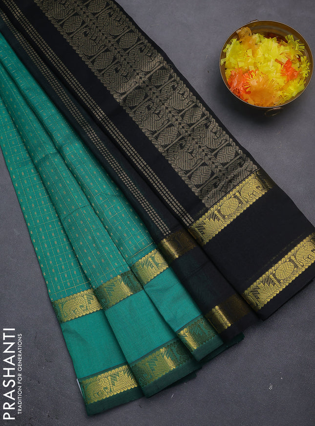 Silk cotton saree teal green and black with allover lakshadeepam weaves and rettapet zari woven border