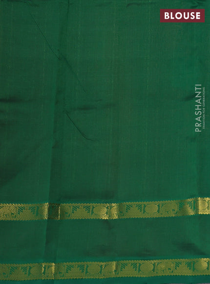 Silk cotton saree red and green with allover lakshadeepam weaves and rettapet zari woven border