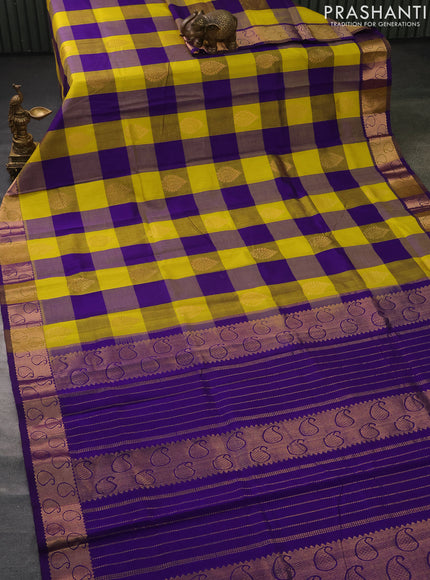 Silk cotton saree yellow and violet with allover paalum pazhamun checks & zari buttas and paisley zari woven border