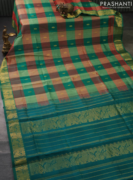 Silk cotton saree multi colour and teal green with allover paalum pazhamun checks & zari buttas and zari woven border