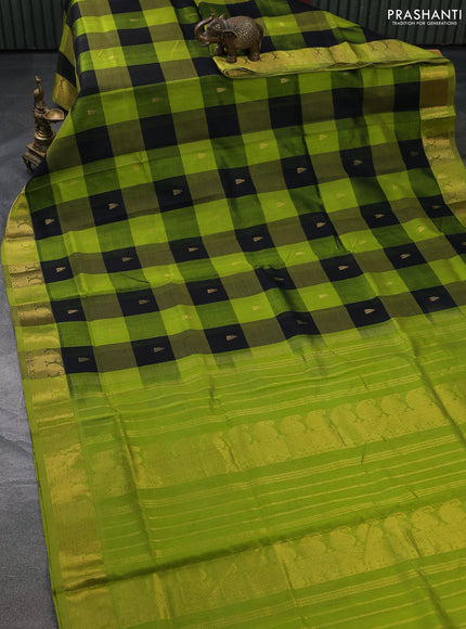Silk cotton saree black and light green with allover paalum pazhamun checks & zari buttas and paisley zari woven border