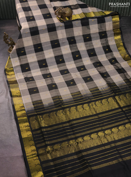 Silk cotton saree beige and black with allover paalum pazhamun checks & zari buttas and paisley zari woven border