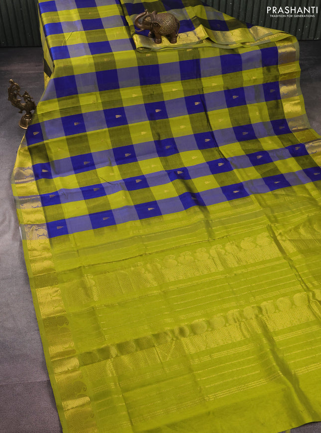 Silk cotton saree blue and light green with allover paalum pazhamun checks & zari buttas and paisley zari woven border