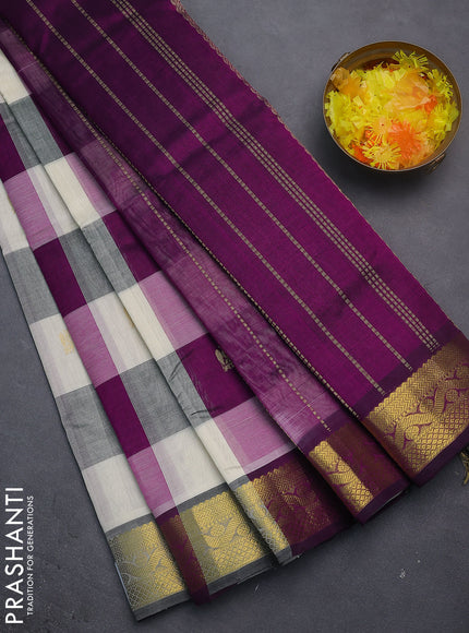 Silk cotton saree cream and purple with allover paalum pazhamun checks & zari buttas and zari woven border