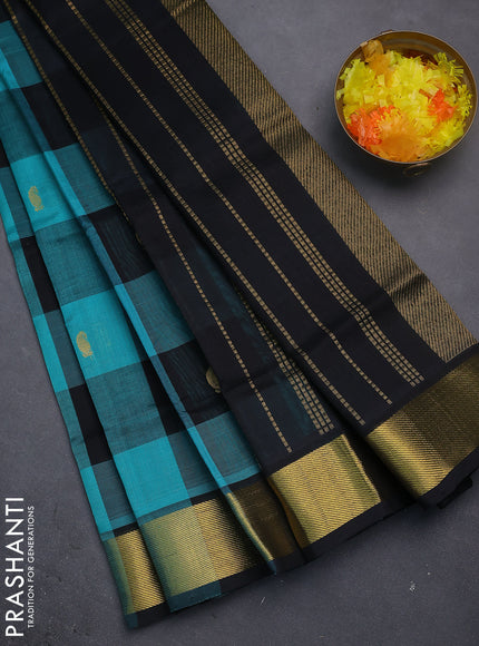 Silk cotton saree teal blue and black with allover paalum pazhamun checks & zari buttas and zari woven border