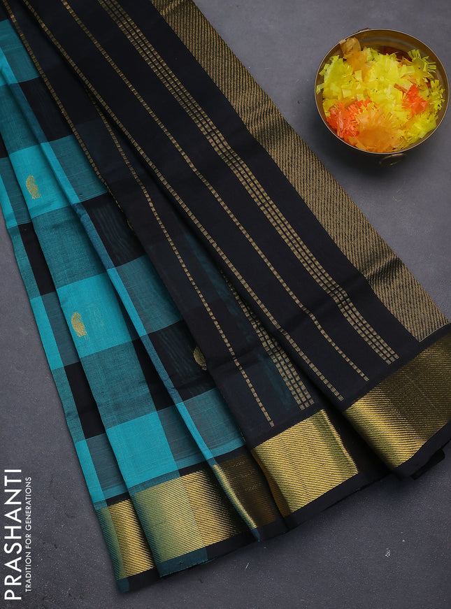 Silk cotton saree teal blue and black with allover paalum pazhamun checks & zari buttas and zari woven border