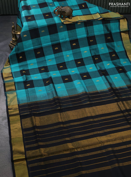 Silk cotton saree teal blue and black with allover paalum pazhamun checks & zari buttas and zari woven border