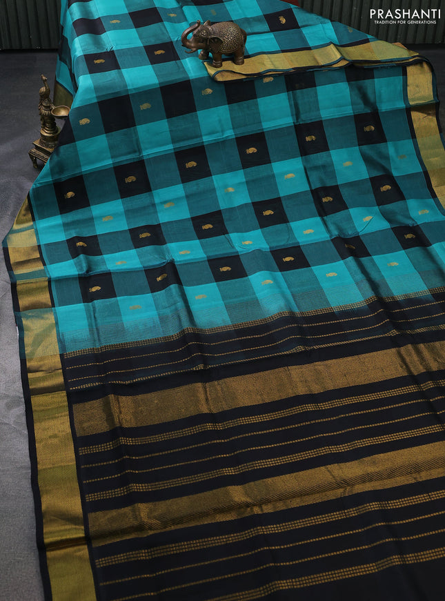 Silk cotton saree teal blue and black with allover paalum pazhamun checks & zari buttas and zari woven border