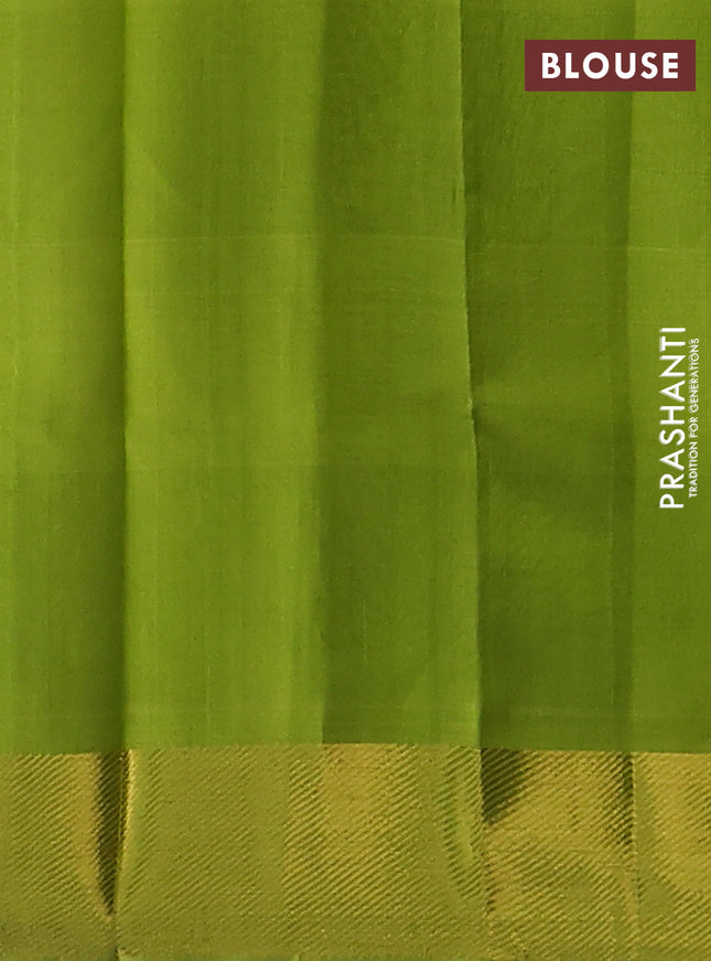 Silk cotton saree purple and light green with allover paalum pazhamun checks & zari buttas and zari woven border