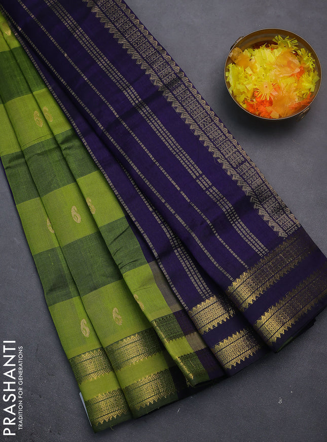Silk cotton saree light green and blue with allover paalum pazhamun checks & zari buttas and rettapet zari woven border