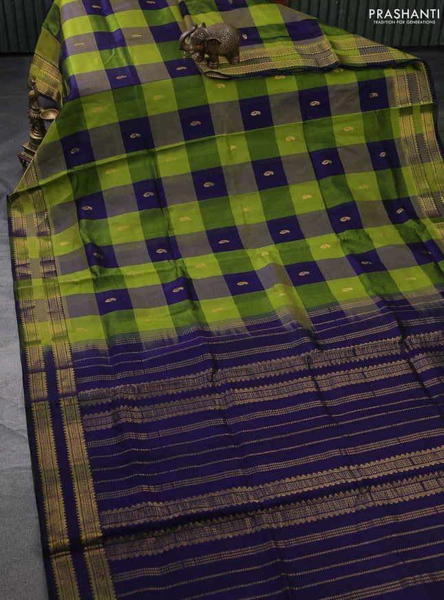 Silk cotton saree light green and blue with allover paalum pazhamun checks & zari buttas and rettapet zari woven border