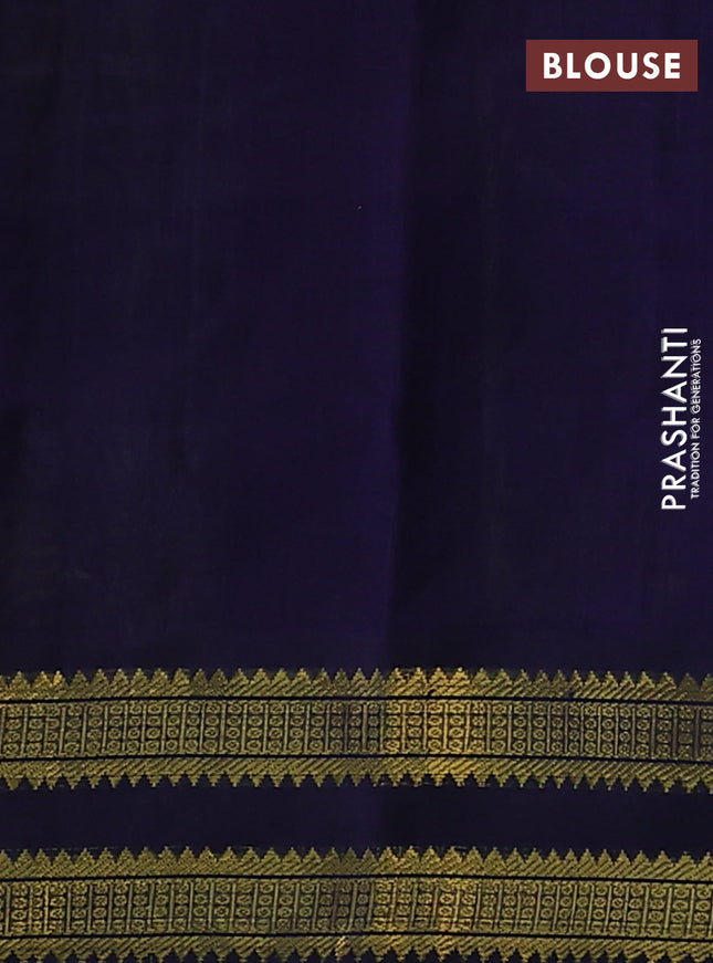 Silk cotton saree light green and blue with allover paalum pazhamun checks & zari buttas and rettapet zari woven border