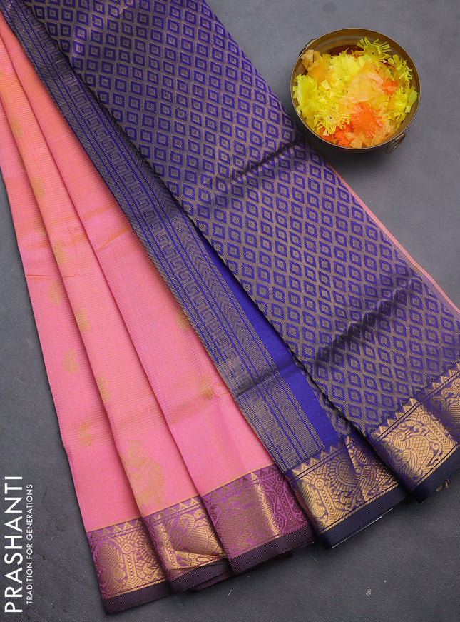 Silk cotton saree peach pink and blue with allover vairosi weaves & buttas and rich zari woven border
