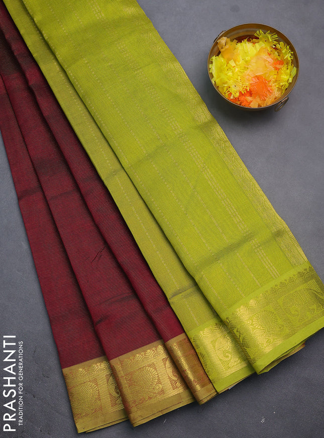 Silk cotton saree maroon and light green with allover vairosi pattern and annam & elephant zari woven border