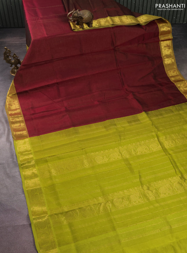 Silk cotton saree maroon and light green with allover vairosi pattern and annam & elephant zari woven border