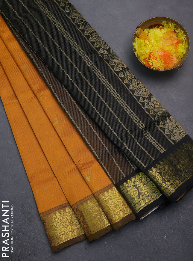 Silk cotton saree mustard yellow and black with allover vairosi weaves & buttas and rich zari woven border