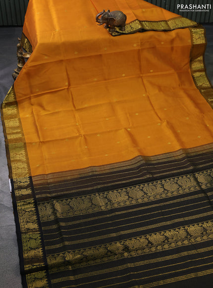 Silk cotton saree mustard yellow and black with allover vairosi weaves & buttas and rich zari woven border