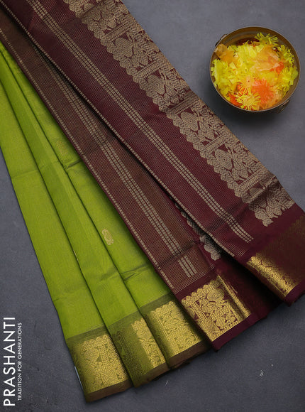 Silk cotton saree light green and coffee brown with allover vairosi weaves & buttas and rich zari woven border
